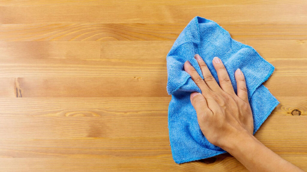 dusting wood table